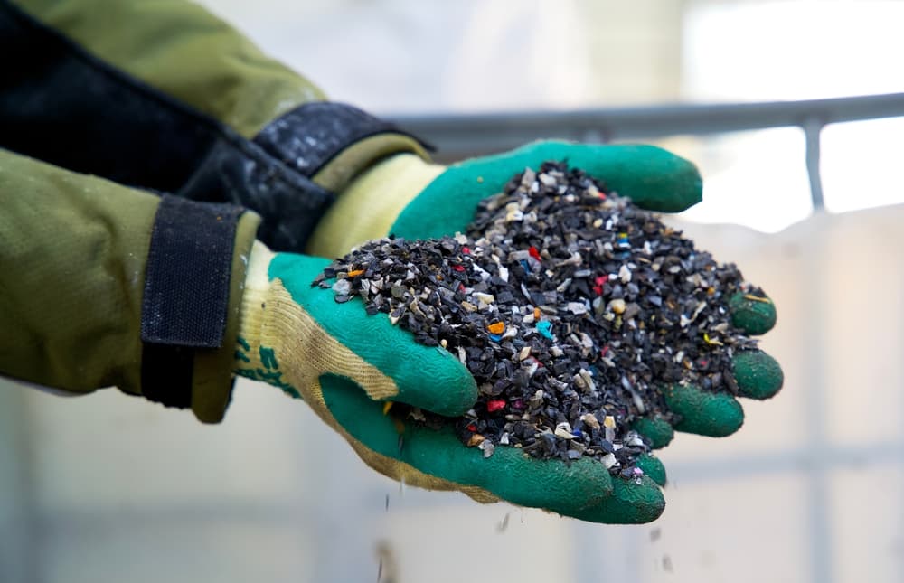 Plastic granulate in a plastic waste recycling plant.